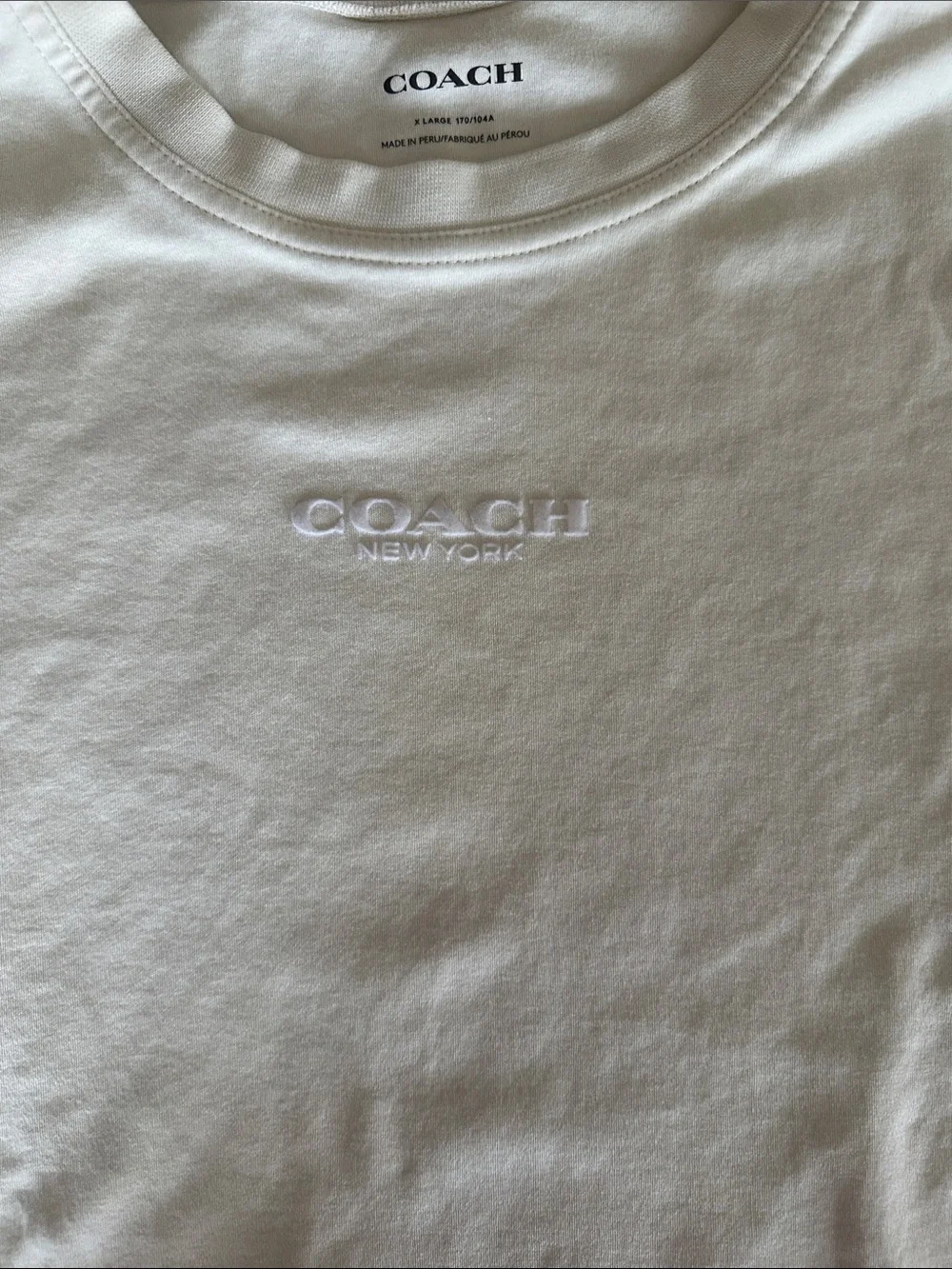 Coach Lot of Two Short Sleeve Tee Shirts in White (XL) and Gray(L)